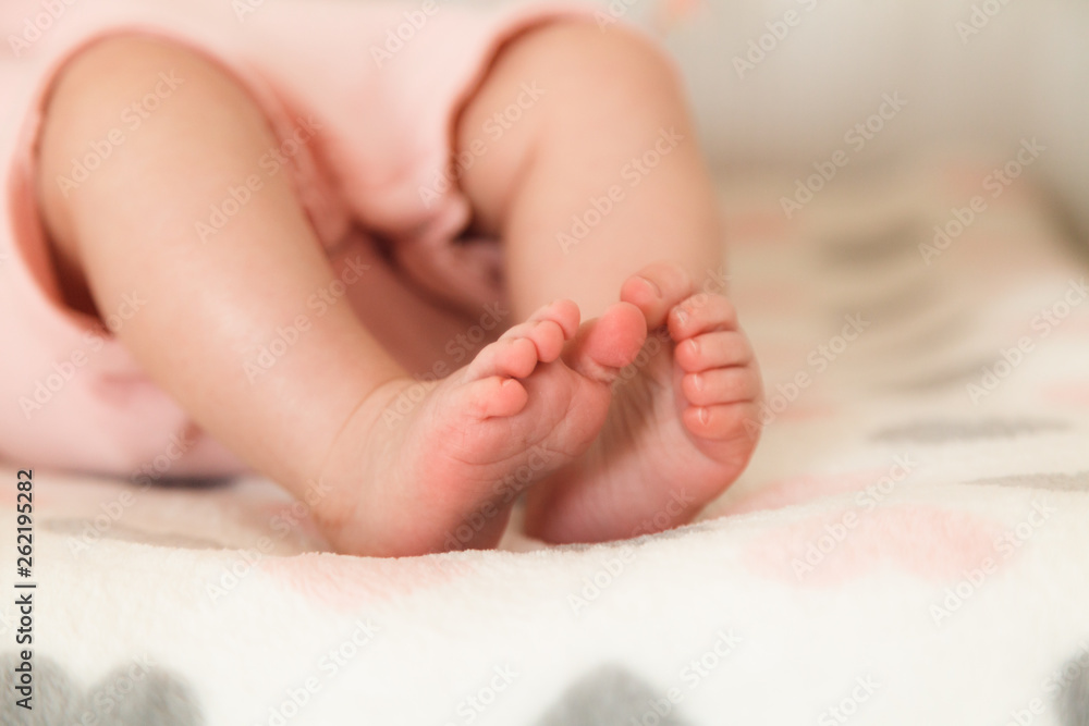 Closeup photo of a tiny baby feet Closeup photo of a tiny baby feet