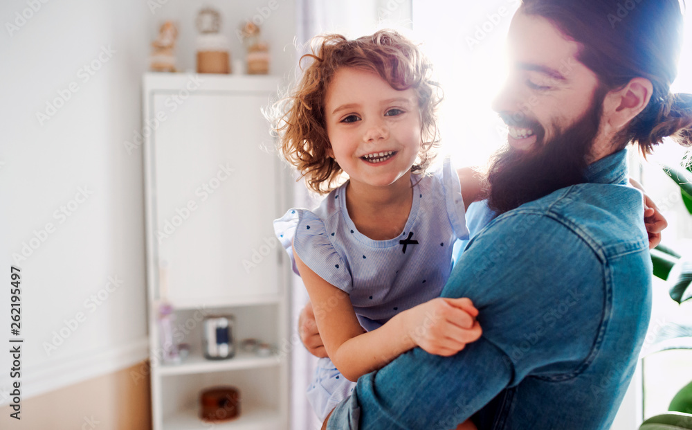 Small girl with young father in bathroom at home, having fun. Small girl with young father in bathroom at home, having fun.