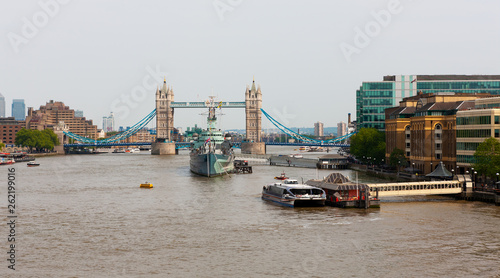 Shipping and tourist attractions on River Thames, London, England