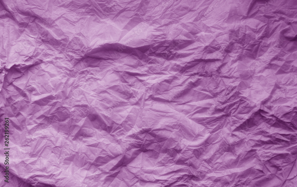 Crumpled sheet of paper in purple color. Crumpled sheet of paper in purple color.