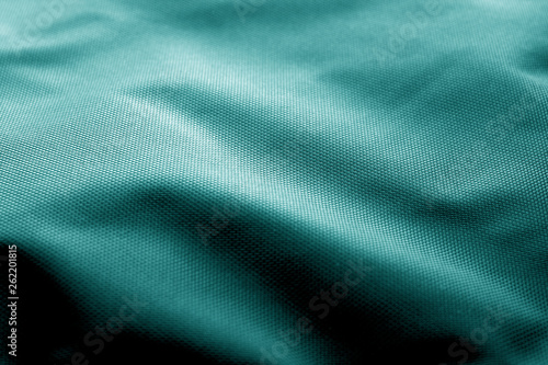 Sack cloth texture in cyan color.