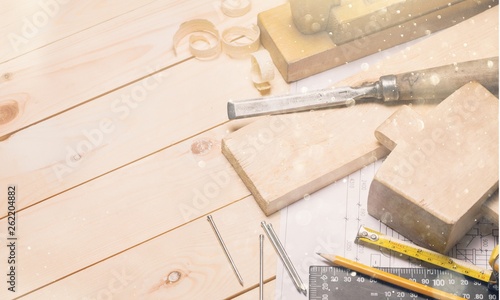 Carpentry tools with wooden planks and Blueprint.