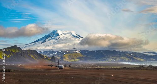 Plane at the vulcanite island Jan Mayen