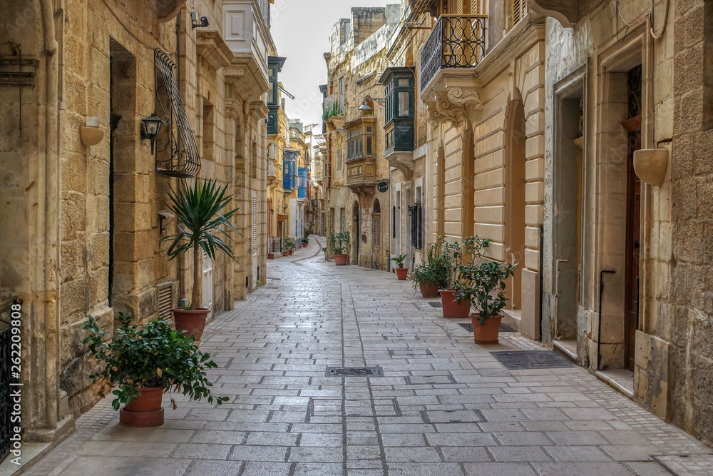View of narrow street in the historical center of Birgu (Vittoriosa), Malta