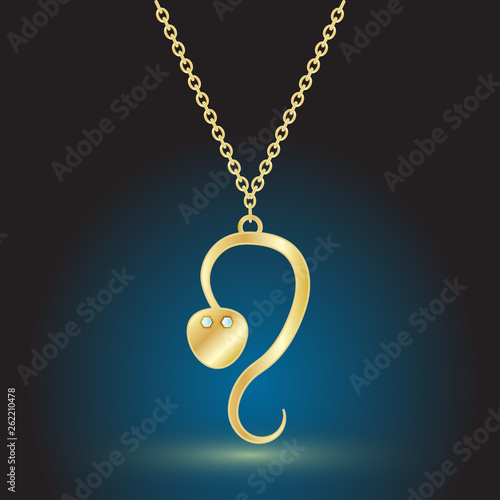 gold pendant jewelry on dark background with backlight.