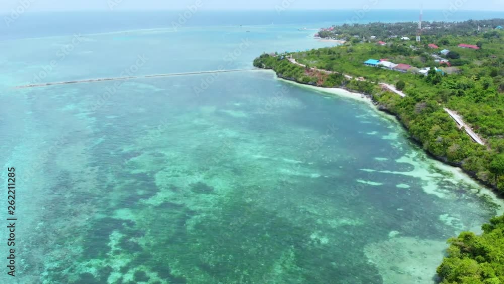Aerial: Flying over tropical beach turquoise water coral reef , Tomia island Wakatobi National Park Indonesia Maldives Polynesia white sand beach Aerial: Flying over tropical beach turquoise water coral reef , Tomia island Wakatobi National Park Indonesia Maldives Polynesia white sand beach