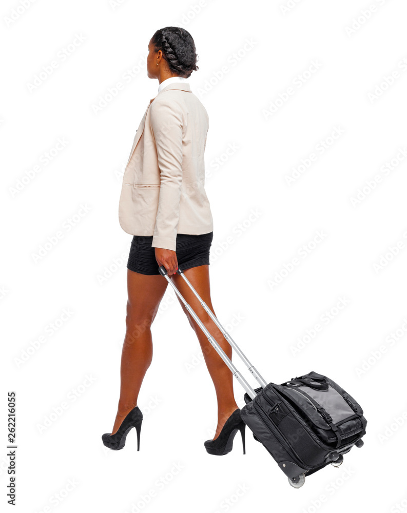 Back view of black African-American in formal attire walking wit Back view of black African-American in formal attire walking wit