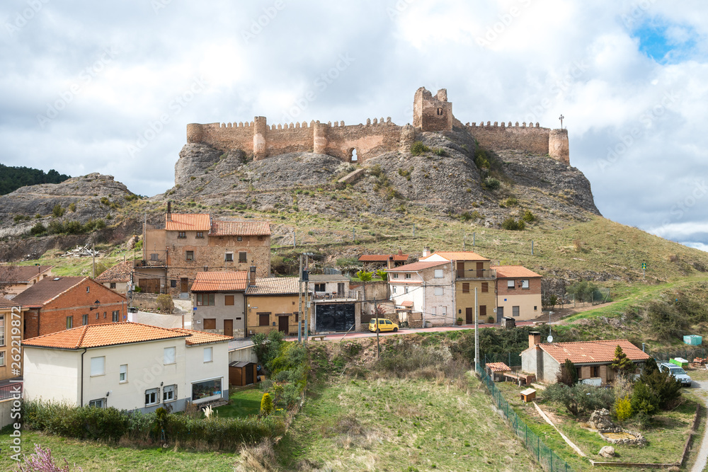 medieval townwith old castle at hill, Spain