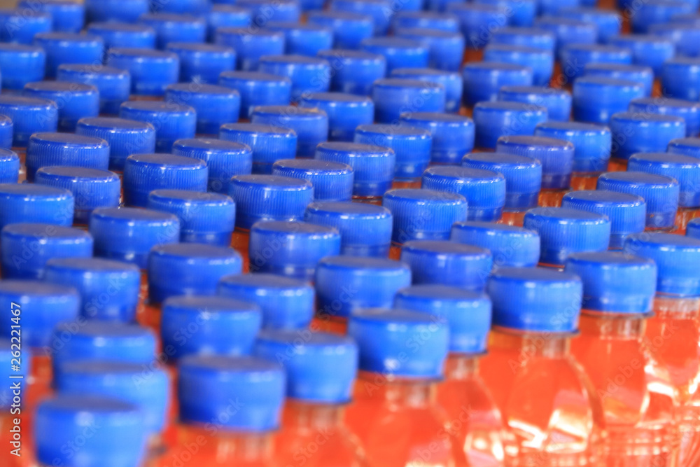 Many bottles of fruit juice are organized in an orderly manner. Many bottles of fruit juice are organized in an orderly manner.