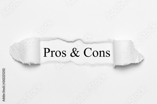 Pros & Cons on white torn paper