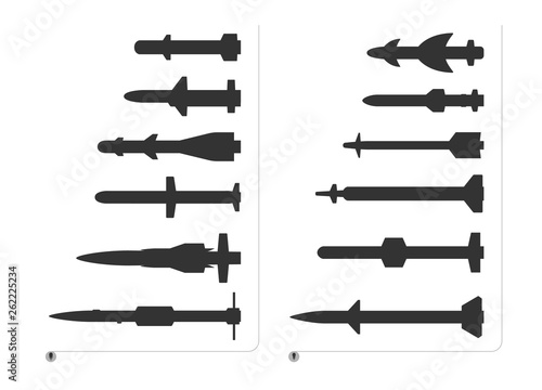 Black vector silhouette of fighter aircraft missiles is on white.