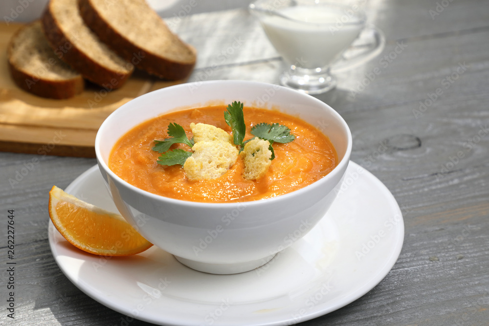 Rich in vegetable protein lentil soup puree with croutons and lemon . Rich in vegetable protein lentil soup puree with croutons and lemon .