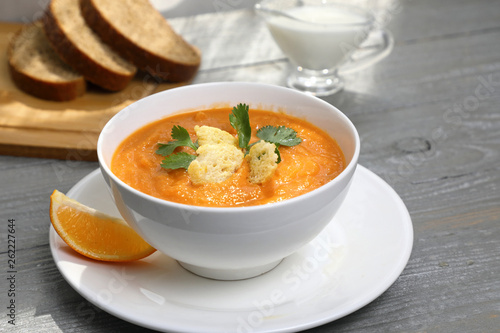 Rich in vegetable protein lentil soup puree with croutons and lemon .