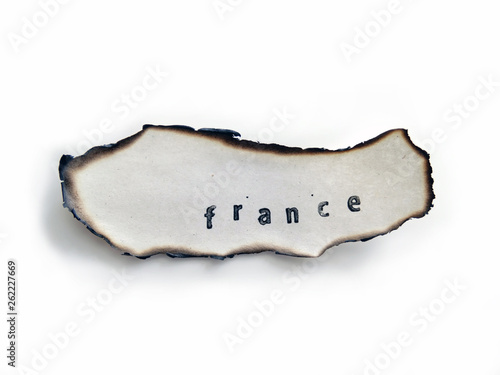 France Stamped on an old burned Paper, Fire april 2019