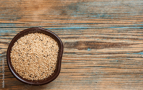 Bilde på lerret amaranth beans in bowl, on rustic wooden background