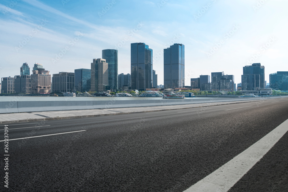 Empty Asphalt Road Through Modern City of Shanghai, China.. Empty Asphalt Road Through Modern City of Shanghai, China..