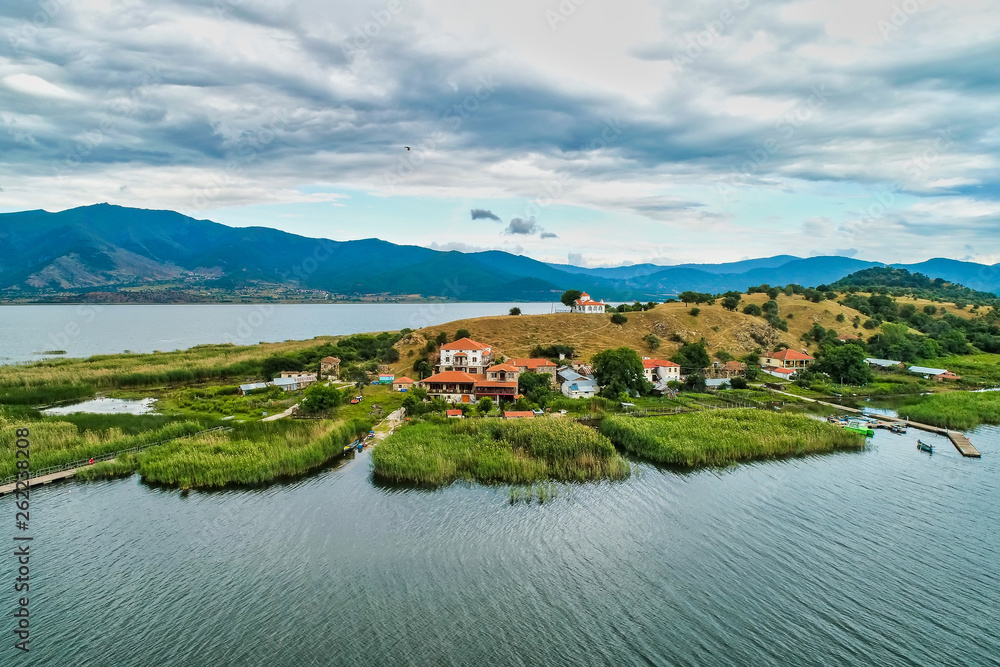 Fototapeta aerial view of island of Agios Achilios in lake Small Prespes, Greece