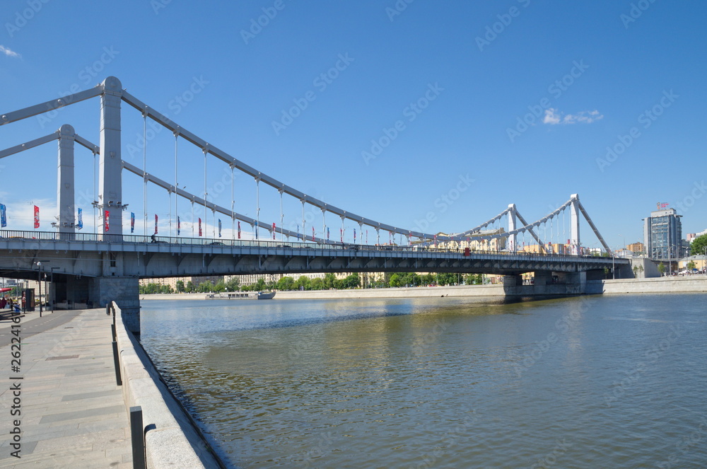 Moscow, Russia - June 15, 2018: Summer view of Krymsky bridge. The first suspension bridge in Moscow. Passes through the Moscow river