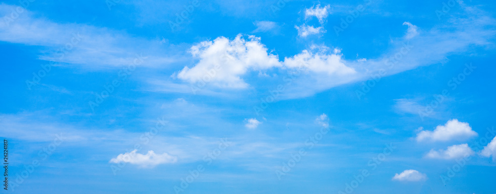 Beautiful panoramic vivid vibrant blue sky with white clouds on a sunny day for web banner. Beautiful panoramic vivid vibrant blue sky with white clouds on a sunny day for web banner.