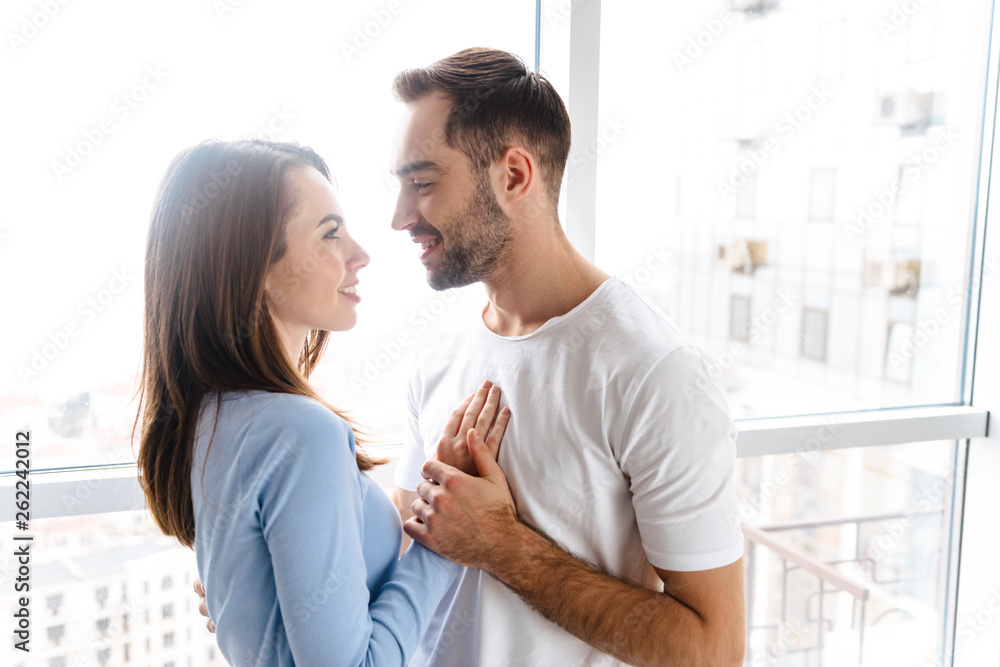 Beautiful young couple drinking coffee Beautiful young couple drinking coffee
