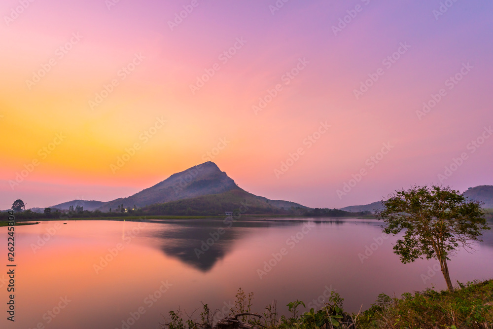 Mountains reflecting water before sunrise (Lam Isu Reservoir) Kanchanaburi, Thailand