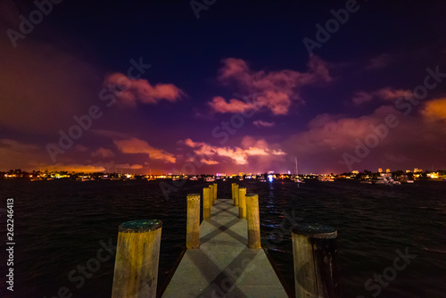 Wooden pier in Watson Island at night