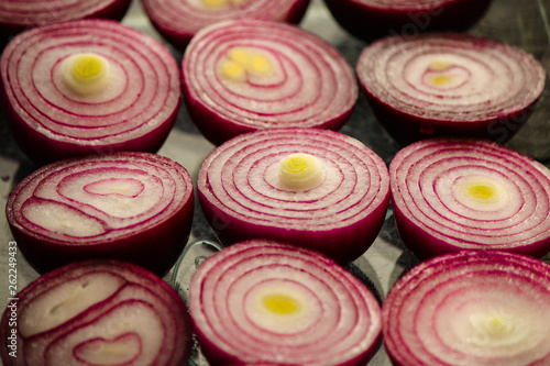 Red onion. juicy fresh vegetable cut, slices. food background. top view