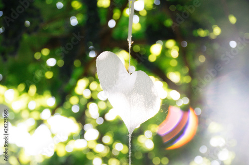 heart made of paper on a string