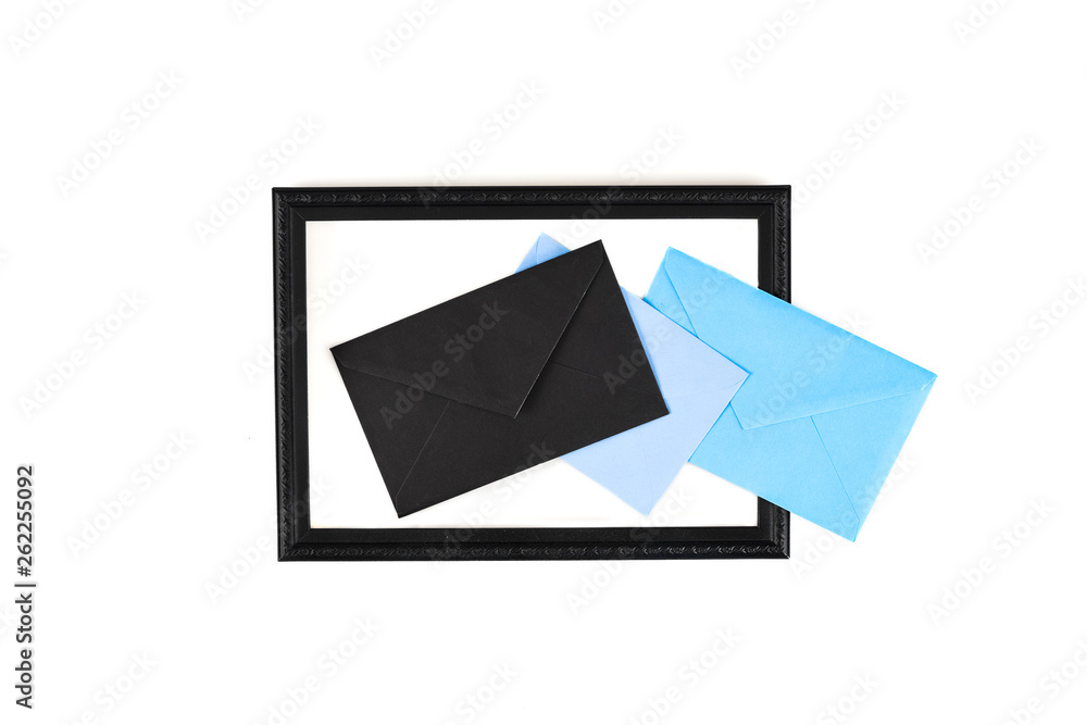 Top view of frame and envelopes isolated on white Top view of frame and envelopes isolated on white