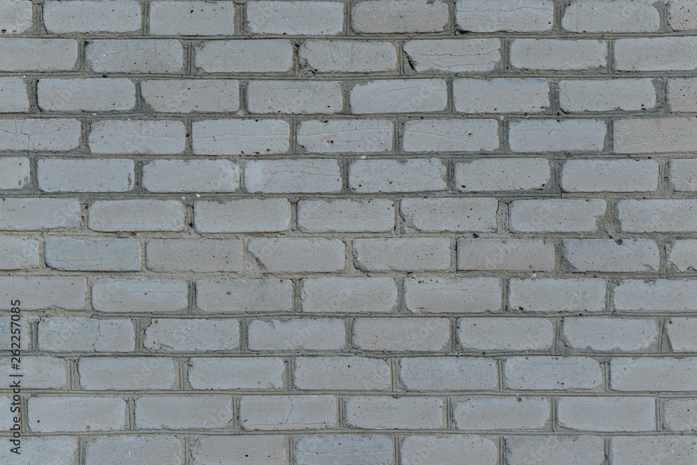 Fototapeta premium Old brick wall with cracks and scratches , background, texture