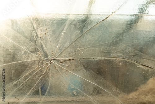 Texture of glass  crack  dust and scratches  close-up