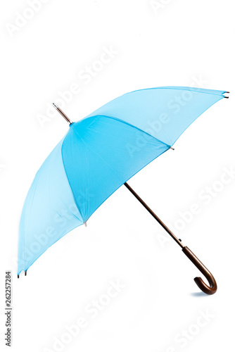 Open big black umbrella with plastic handle on white