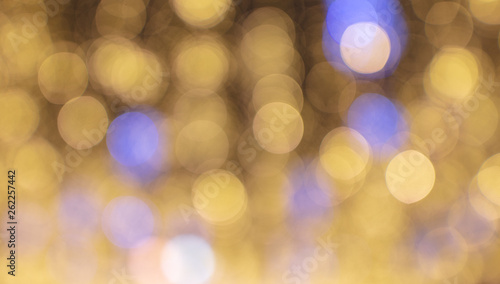 Golden bokeh lights as abstract background