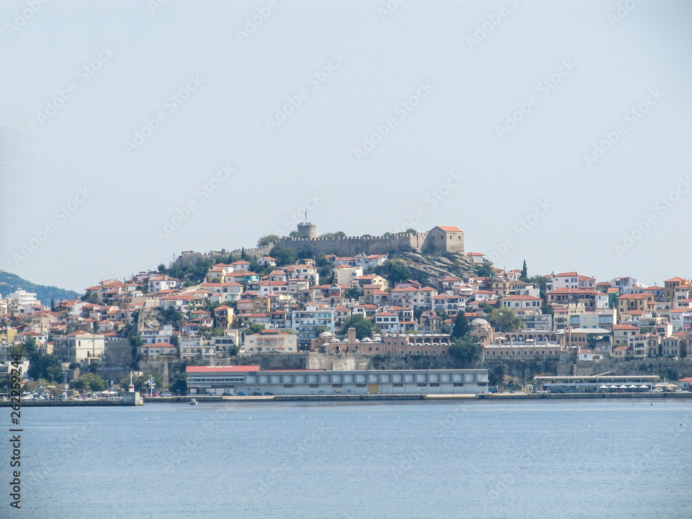 Beautiful view from the sea to the city on the island and the ancient fortress