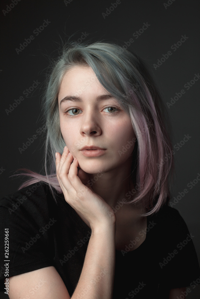 Portrait of the beautiful girl with dyed hair. Close up Portrait of the beautiful girl with dyed hair. Close up