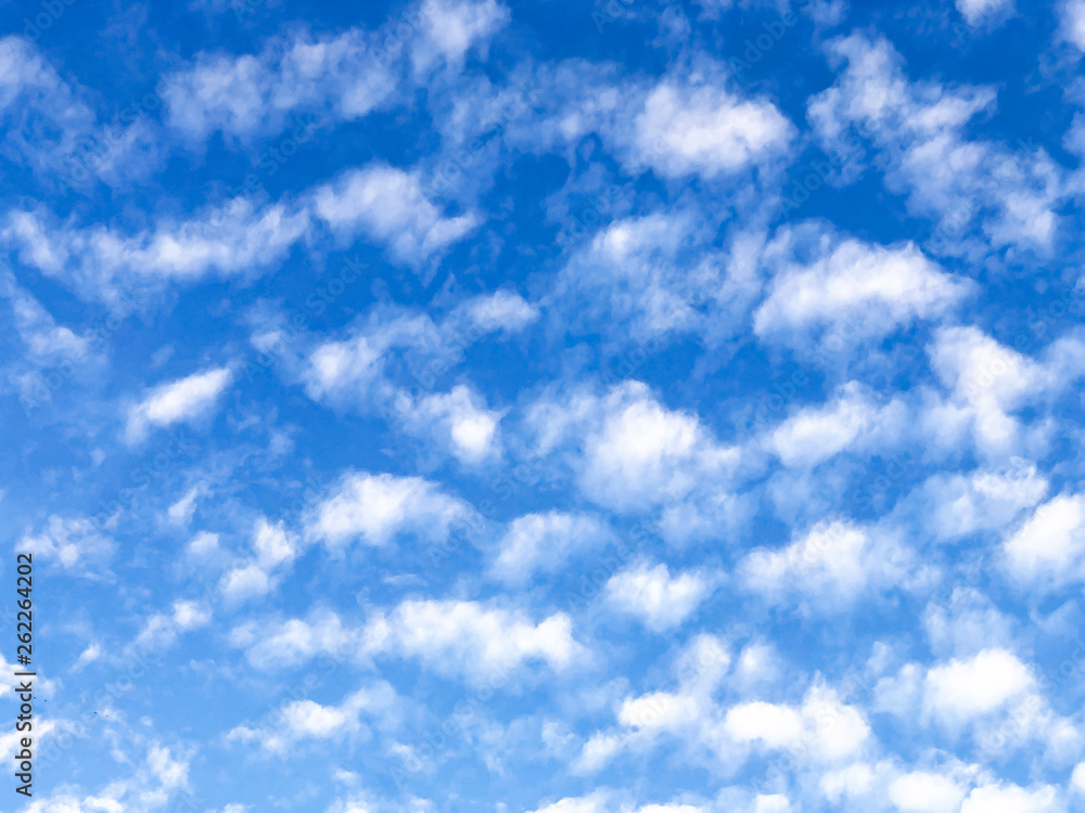 The abstract art design background of blue sky with smoky waving cloud,beauty by nature The abstract art design background of blue sky with smoky waving cloud,beauty by nature