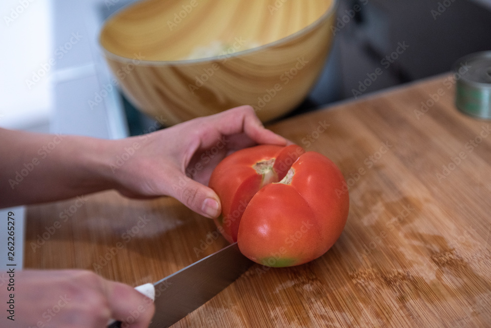 hands holding sharp knife and chopping hands holding sharp knife and chopping