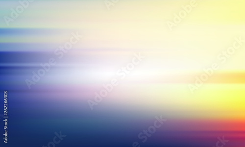 Blurred yellow-blue background. Light sky and sea landscape.