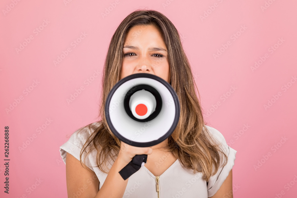 Fototapeta premium Angry Woman Protesting While Using Megaphone