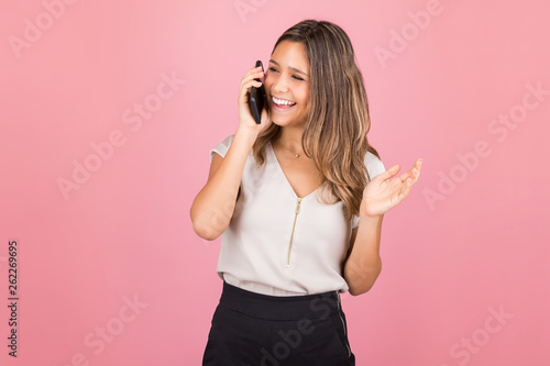 Woman Talking On Cell Phone And Smiling