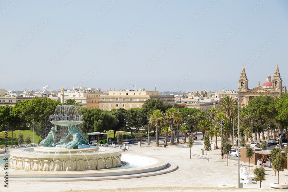 Triton Fountain located on the periphery of the City Gate of Valletta, Malta