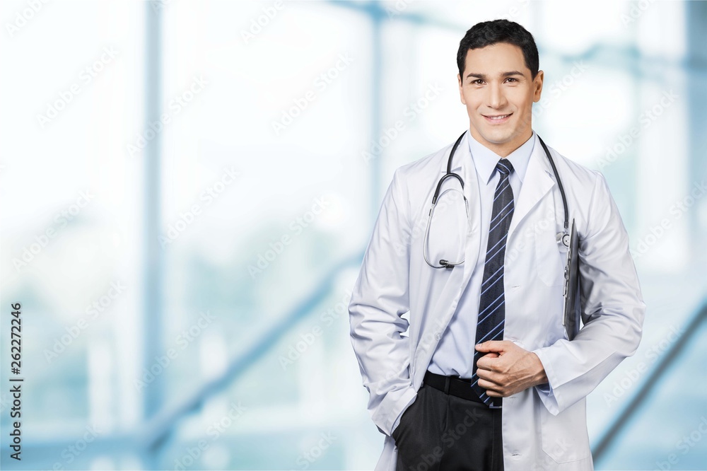Attractive young female doctor student on background