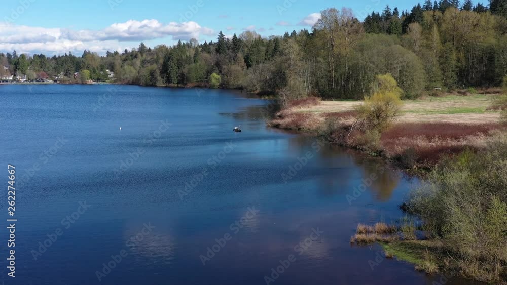 Aerial View at Mountain Lake with Blue Sky in British Columbia, Canada. 4K.