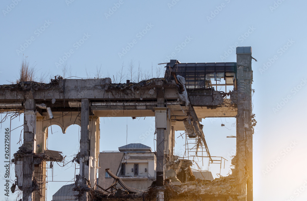 wreck building at sunrise. destroyed house