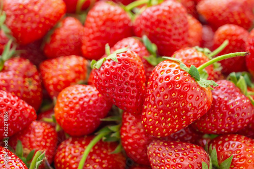 Fresh organic red ripe Strawberry fruit background closeup