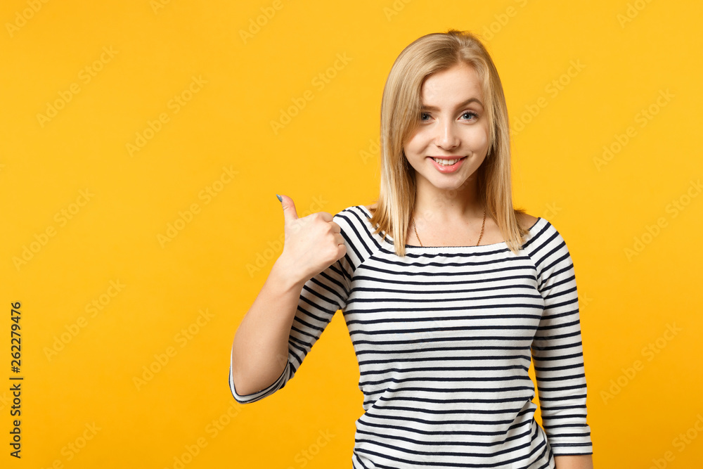 Beautiful smiling young blonde woman in striped clothes looking camera isolated on bright yellow orange wall background, studio portrait. People sincere emotions lifestyle concept. Mock up copy space. Beautiful smiling young blonde woman in striped clothes looking camera isolated on bright yellow orange wall background, studio portrait. People sincere emotions lifestyle concept. Mock up copy space.