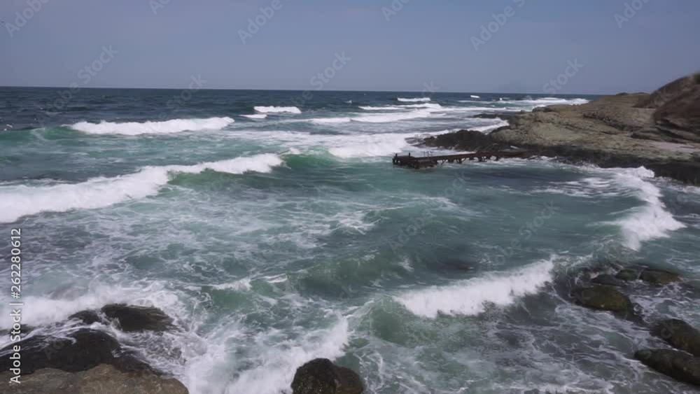 Slow Motion Panning across Black Sea and beach with dock, Bulgaria Slow Motion Panning across Black Sea and beach with dock, Bulgaria