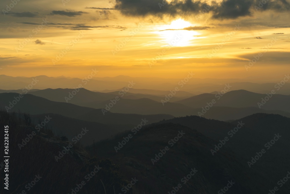 Sunset over layers of mountains
