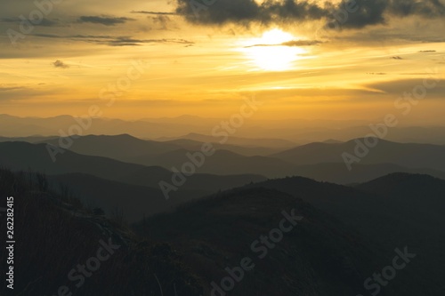 Sunset over layers of mountains