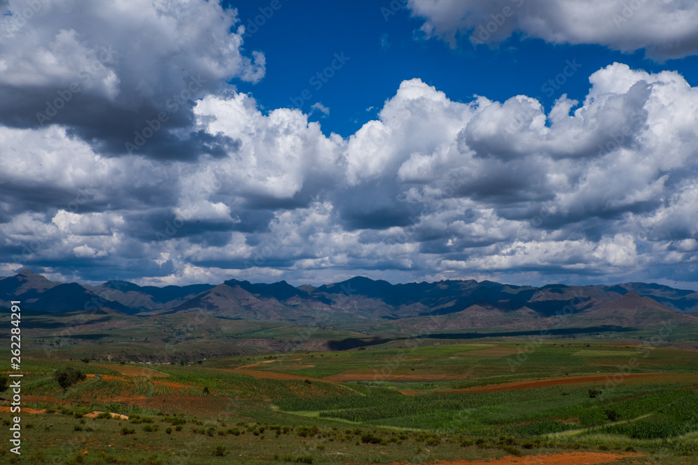 Landscape view over green mountains with  clouds, Lesotho, Africa